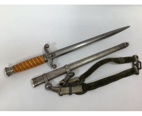 A German Third Reich 4th pattern Army officer's dress dagger (Heer) with orange celluloid handle, oak leaf pommel, cross guar