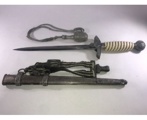 A German Third Reich Luftwaffe style 2nd pattern officer's dress dagger, with wire bound white celluloid handle, Swastika glo