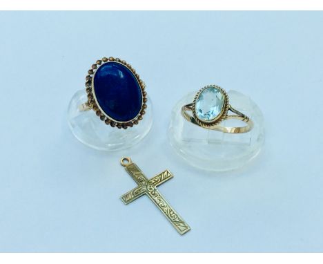 A 9ct gold dress ring set with an oval cabochon lapis lazuli stone, weighs 3.6 grams, finger size M. Together with a 9ct gold