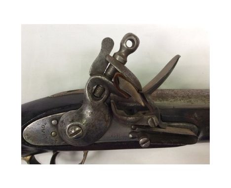 A late 18th/ early 19th century flintlock carbine, with 23" inch steel barrel, lock engraved with crowned GR and Tower mark, 