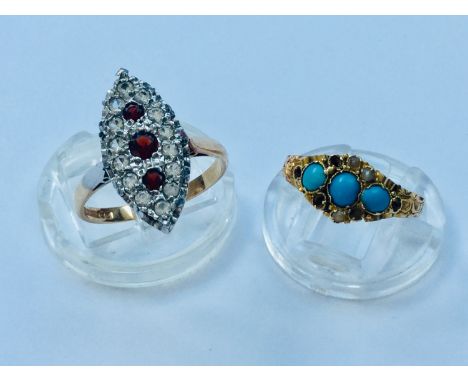 A 9ct gold Art Deco style dress ring set with 3 x round faceted red stones, surrounded by small white stones, weighs 3.7 gram