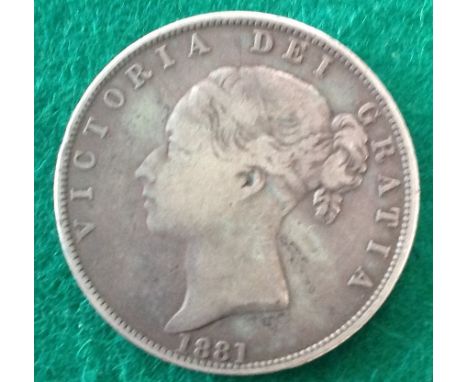 A Queen Victoria 1881 silver half crown in fine/good fine. 