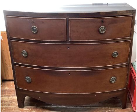 A 19th century mahogany bow front chest of two short, over two long graduated drawers, raised on shaped bracket feet, 100cm w