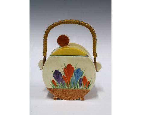 Clarice Cliff Bon Jour Crocus pattern biscuit jar and cover, with wicker handle, 16 x 18cm (small chips to lid)