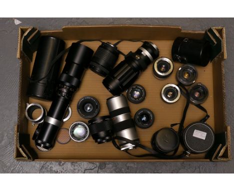 Various Lenses: quantity of various lenses including Super Travenon f/5.6 300mm mirror lens, Minolta Rokkor-PF f/1.4 58mm, Si