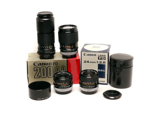 Canon FD Lenses: quantity of various Canon FD lenses including FD S.S.C. f/2.8 24mm, FD S.C. f/2.8 35mm, FD S.C. f2.5 135mm a