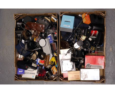 Various Accessories: quantity of various accessories including  filters, light meters, cases and more (2 boxes)