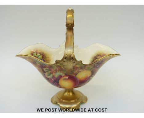 Royal Worcester painted fruit pedestal basket, signed J Skerret (26cm tall, length 28cm) 