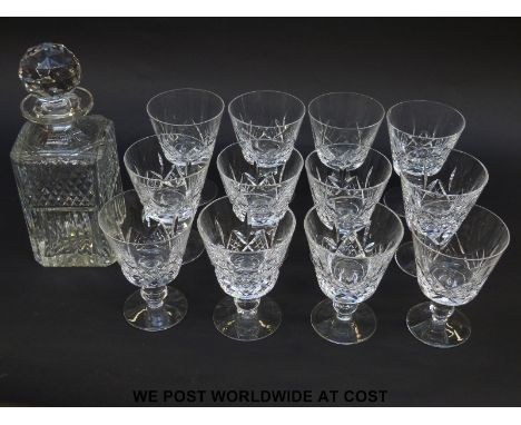 A set of 12 Stuart Crystal cut wine glasses (12.7cm tall), together with a decanter