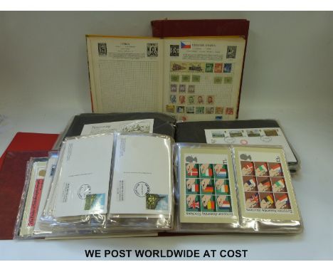 A Simplex album of Commonwealth stamps, a Fanfare album and two albums of PHQ cards and first day covers