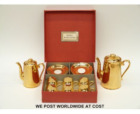 Royal Worcester cased set of six coffee cans and saucers, hot water jug and coffee pot all in gold lustre 