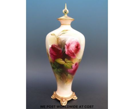 Royal Worcester footed and lidded vase hand decorated with roses, signed Hood (height with lid 30cm)