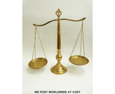 A set of Eastern brass banking type scales, height 51cm 