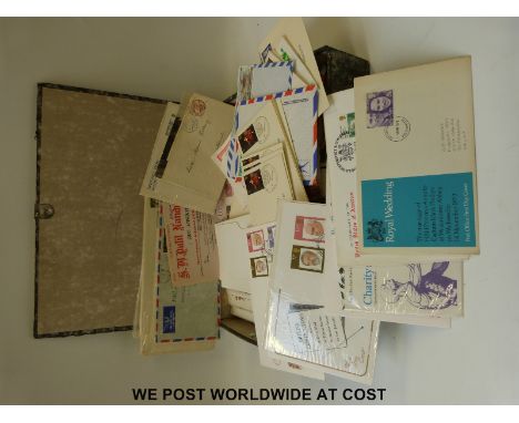 A quantity of GB, world covers and first day covers in a box file