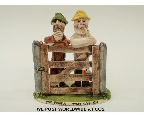 A Will Young pottery group of Tom Pearse and Tom Cobley leaning on a gate, with a goose