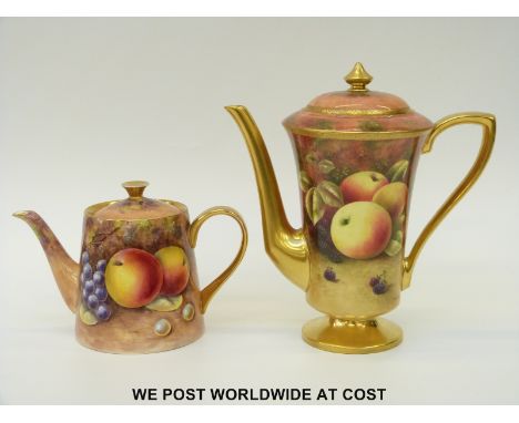 Coffee pot and tea pot each hand decorated with painted fruit, one signed R Budd (ex Royal Worcester) the other Lany (tallest