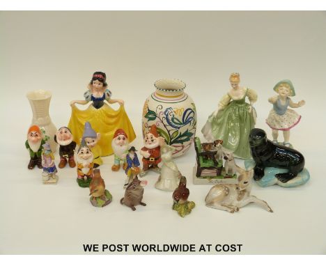 A collection of ceramics including a Beswick mouse and birds, Royal Doulton figurine, a seal on ice, Belleek, Poole Pottery v