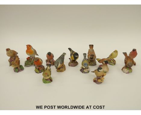 Fifteen small Royal Worcester bird figures 