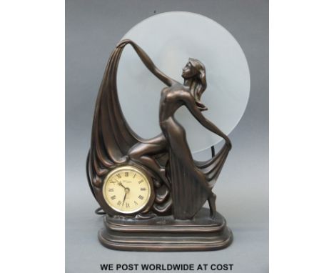 An Art Deco style figural lamp with clock insert, height 40cm