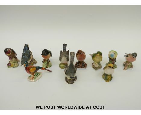 A collection of Beswick birds including a first version whitethroat 