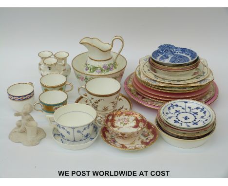 A collection of mainly Minton porcelain including cabinet cups and saucers, 19thC jug and a parian figure