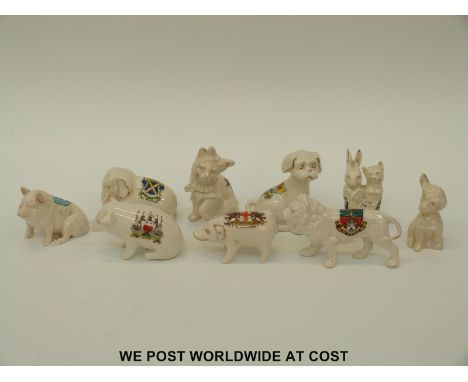 Nine crested ware ceramic animals to include Carlton china pig Hull, City of London pig, Willow Art lion Windsor etc