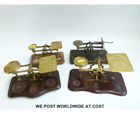 Four brass postage scales including a set marked John Heath, Birmingham