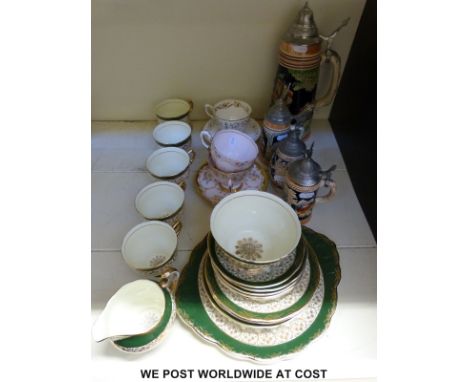 An Imperial part tea set, four steins and three assorted Tuscan cups and saucers