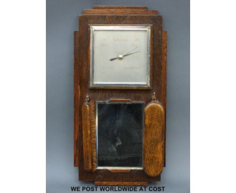 An Art Deco oak wall barometer with square dial together with brushes and mirror