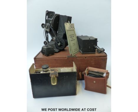 A Pathescope 9.5mm cine projector together with two vintage cameras. 