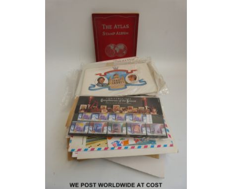 A bag of mint GB stamps and first day covers, together with a mint set of Commonwealth Omnibus Royal Wedding stamps