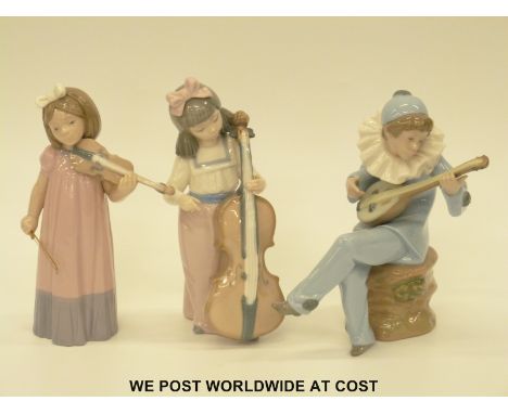 Three Nao child musician figures