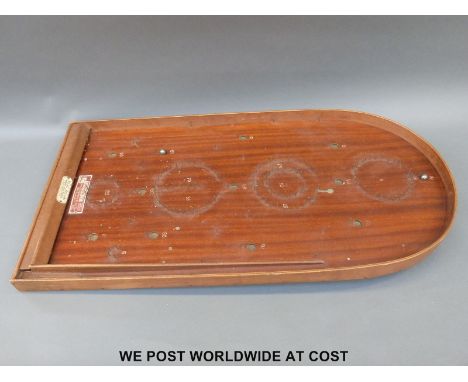 A tournament National Corinthian 21T Bagatelle board, with 'Ivorine' label bearing the retailers name Russell Hillsdon Gunmak
