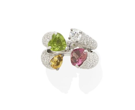 A diamond and mixed gemstone ringcentering a rubellite, peridot, citrine and diamond; mounted in 18k white gold; estimated to