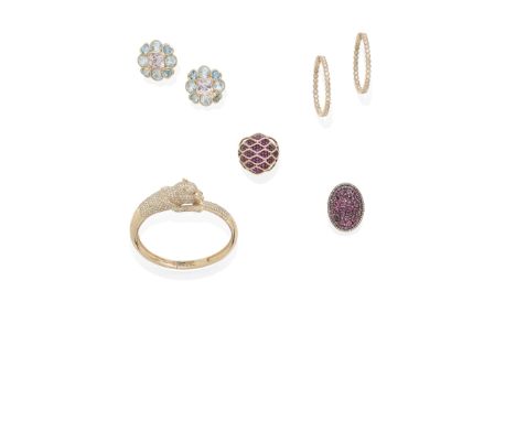 A pink tourmaline and diamond ring mounted in silver and 18k gold; size: 7Lot to be sold without reserve.