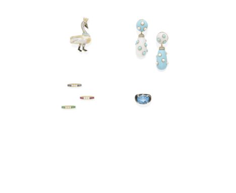 A blue topaz, diamond and onyx ringcentering an oval-shaped checkerboard cut blue topaz weighing approximately 11.65cts;  mou