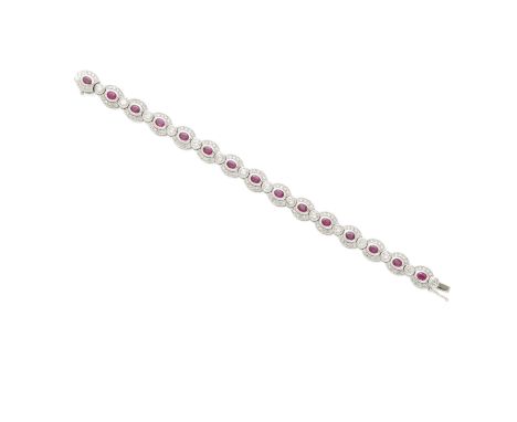 A ruby and diamond braceletcentering 15 oval-cut rubies with a known weight of 4.01cts; mounted in 14k white gold; estimated 