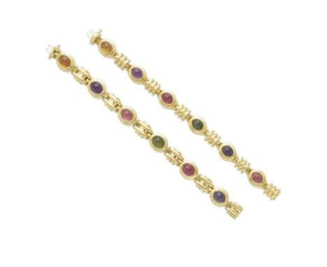 A pair of 18k gold and colored stone braceletseach set with six carved oval shaped cabochon-cut gemstones including iolite, p