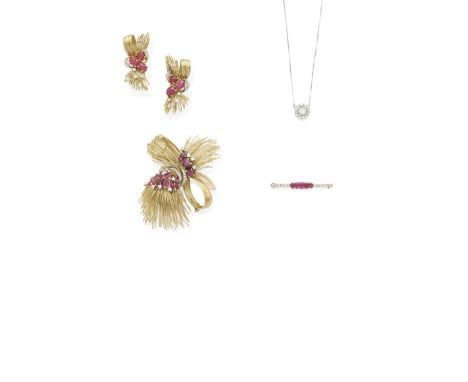 An art deco ruby and diamond brooch, circa 1920 mounted in platinum-topped gold; estimated total diamond weight: 0.95ct;  len