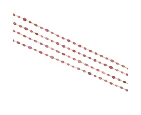 A ruby longchain necklace mounted in 18k gold; gross weight approximately: 36 grams; length: 77in.