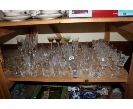Shelf of cut crystal drinking glasses 