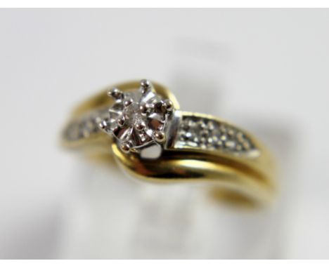 9ct gold fancy diamond solitaire ring with diamond set shoulders