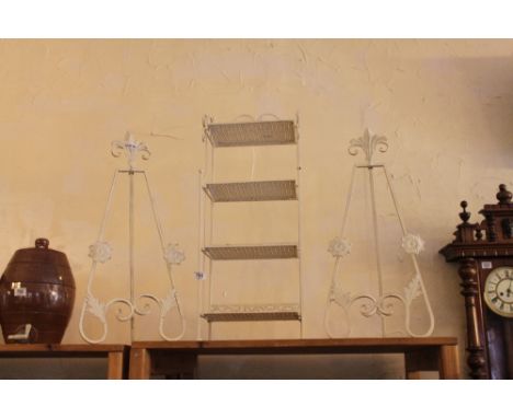 Two white painted metal easels and folding metal shelf rack