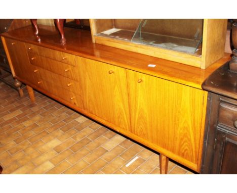 Light oak sideboard with three cupboards and four drawers, L ~ 233cm