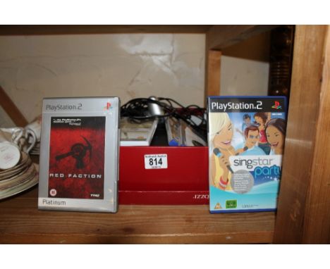 Playstation 2 games console with controllers and games