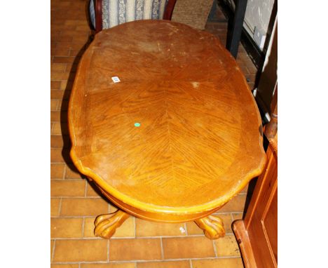 Light oak coffee table on ball and claw feet