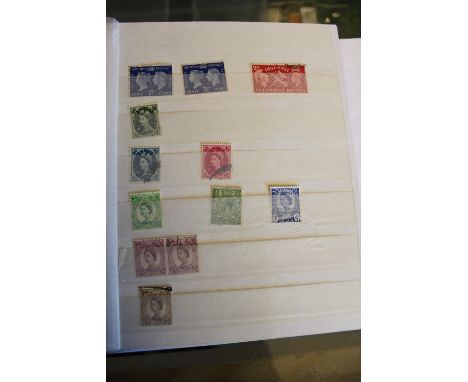 Two Commonwealth stamp albums