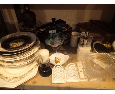 Shelf of mixed items including plates, glass, clock etc