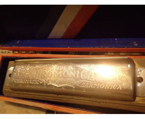 Boxed Hohner super chromonica harmonica