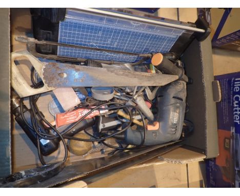 Box of tools including Black and Decker electrical drill, hand saws, hammers etc